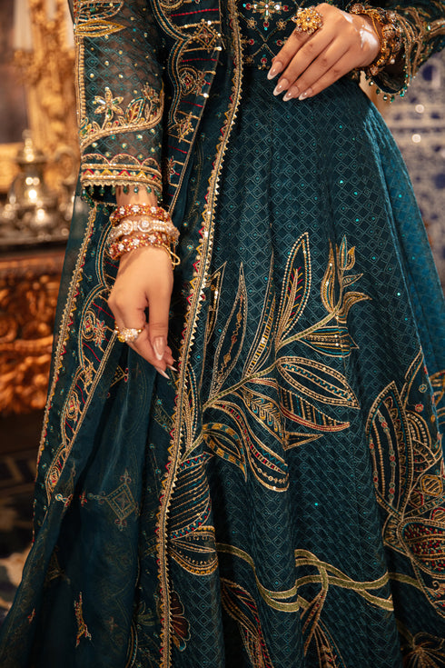 Model wearing full naqshi zeemal 3PC set: hand‑adda organza choli, geometric sequin lehenga, ornate dupatta styled with bridal poise and regality.